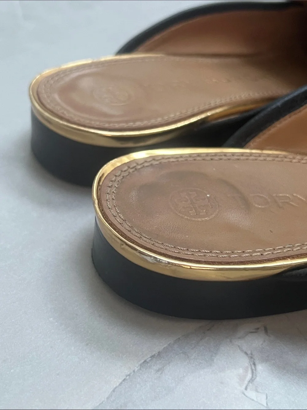 Tory Burch Jessa Backless Loafers in black pebbled leather